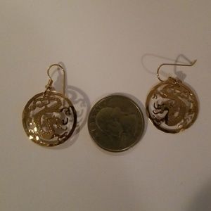 Dragon gold tone earrings pierced